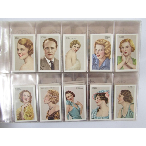 428 - Cigarette and tea cards in four albums to include Brooke Bond Tea, John Player & Sons Characters fro... 