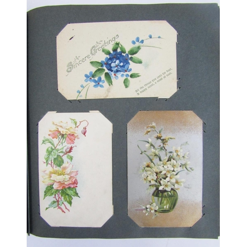 438 - Early 20th century postcard album containing colour, black and white greetings and other cards, 50 p... 