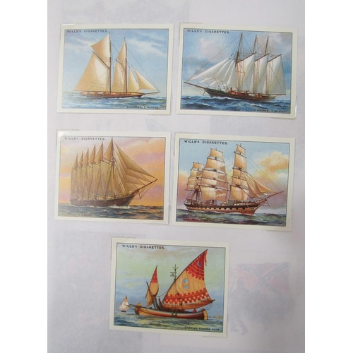 441 - Extensive collection of mostly reproduction cigarette and tea cards in various albums, including Wil... 