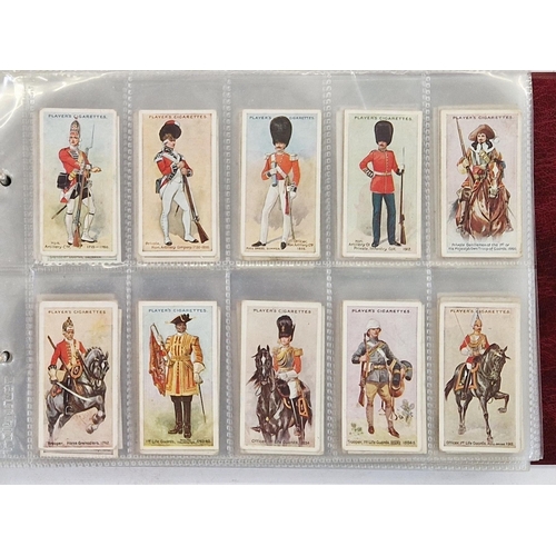 446 - Six ring binder albums of cigarette cards to include Edwards, Ringer & Bigg Musical Instruments set,... 