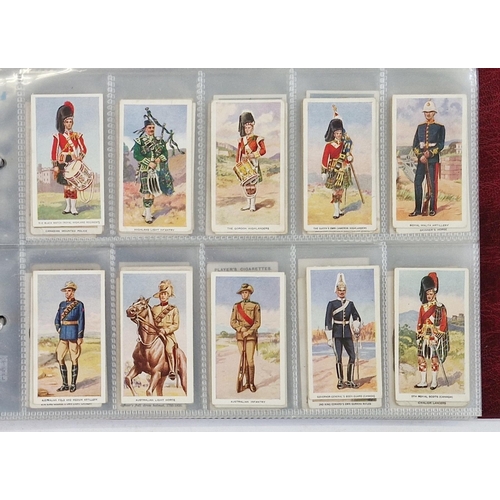 446 - Six ring binder albums of cigarette cards to include Edwards, Ringer & Bigg Musical Instruments set,... 