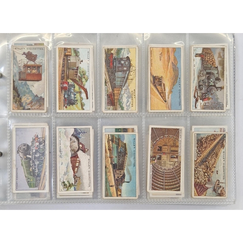 447 - Collection of 11 cigarette card part sets ring binder albums including numerous sets by Wills such a... 