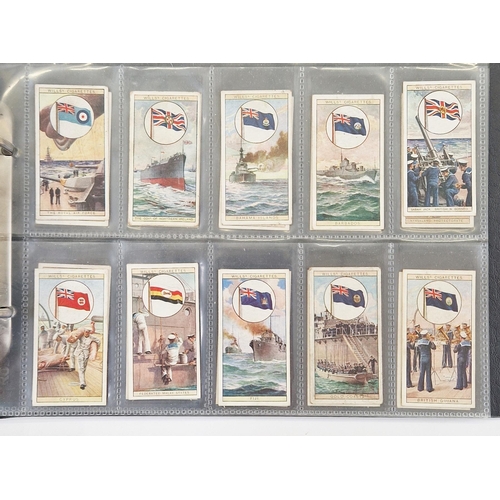 447 - Collection of 11 cigarette card part sets ring binder albums including numerous sets by Wills such a... 