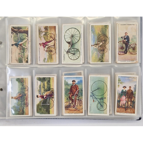 447 - Collection of 11 cigarette card part sets ring binder albums including numerous sets by Wills such a... 