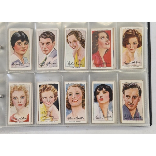 447 - Collection of 11 cigarette card part sets ring binder albums including numerous sets by Wills such a... 