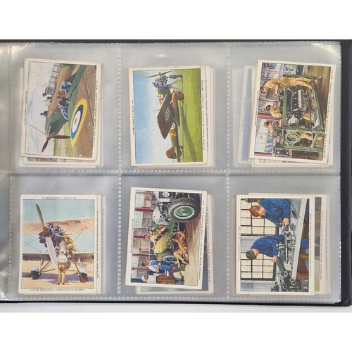 447 - Collection of 11 cigarette card part sets ring binder albums including numerous sets by Wills such a... 