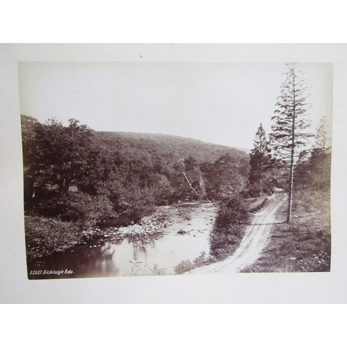 402 - Photograph album containing late 19th/early 20th century, containing views of Looe, Cornwall, Glouce... 