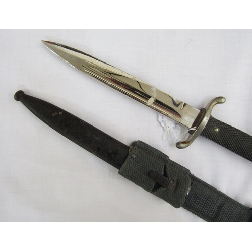 247 - WWII German fireman's dress bayonet with scabbard and bayonet frog.