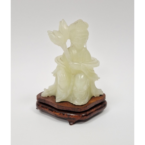 114 - Chinese carved jade figure of seated female figure with lotus blossom, 8.5cm high and the hardwood w... 