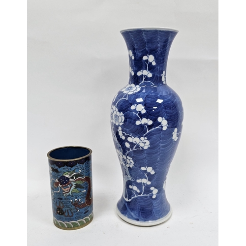 121 - Chinese porcelain inverse baluster vase with flowering prunus blossom on a blue wash ground, four-ch... 