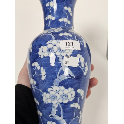 121 - Chinese porcelain inverse baluster vase with flowering prunus blossom on a blue wash ground, four-ch... 