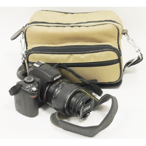 145 - Nikon D40x digital camera, with instruction booklet, carry case, digital field guide book, various a... 