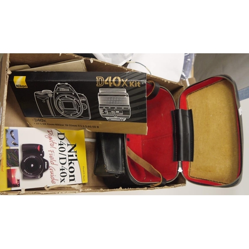 145 - Nikon D40x digital camera, with instruction booklet, carry case, digital field guide book, various a... 