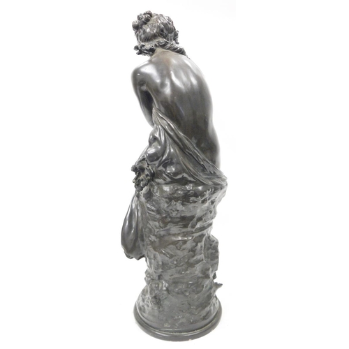 155 - After Mathurin Moreau, large bronzed resin figure of classical woman seated on a rock and draped sem... 