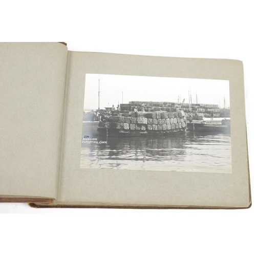 172 - Crocodile skin photograph album containing approximately 42 black and white photographs dating aroun... 