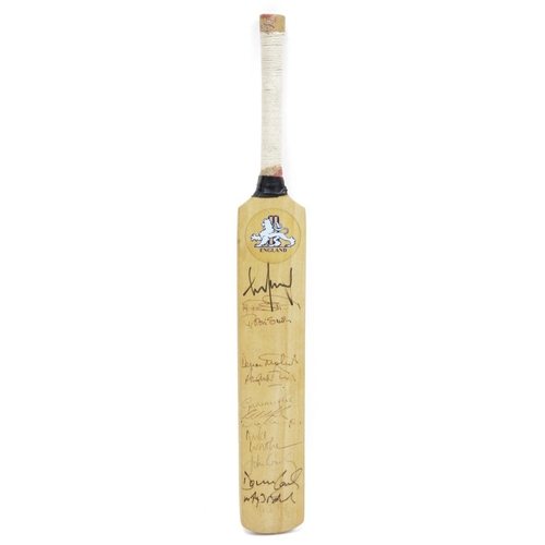 236 - Miniature cricket bat signed by the England team including Robin Smith, Graham Hick, Alec Stewart, D... 