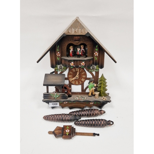 1008 - 20th century Blackforest wooden cuckoo clock in the form of a chalet, with wood chopper and water wh... 