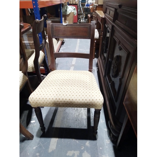 1050 - Set of three Regency mahogany brass inlaid dining chairs, each with reeded supports with stuffover s... 