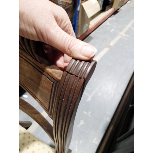 1050 - Set of three Regency mahogany brass inlaid dining chairs, each with reeded supports with stuffover s... 