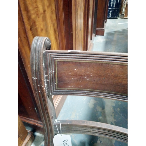 1050 - Set of three Regency mahogany brass inlaid dining chairs, each with reeded supports with stuffover s... 