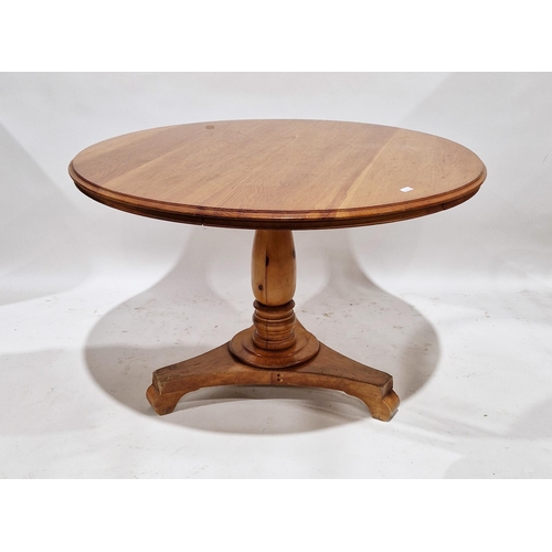 1051 - Pine circular dining table on substantial turned column and tripod base, 79cm high x 118cm diameter ... 