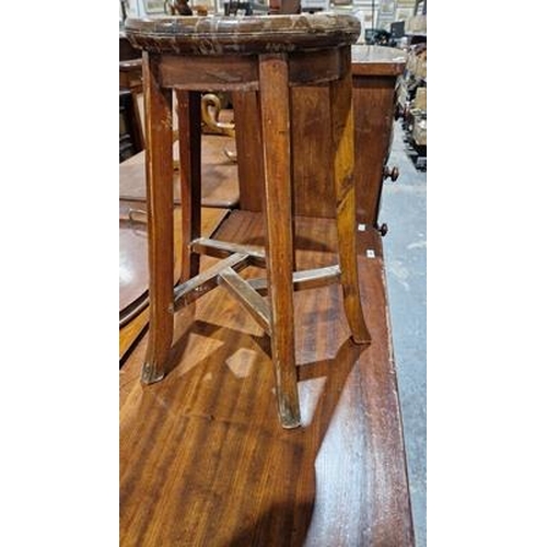 1062 - Early 20th century Chinese stool, the circular top raised on four splayed legs joined by interlockin... 