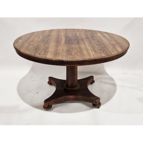 1072 - William IV/early Victorian rosewood breakfast table, the circular tilt-top with beaded edge, raised ... 