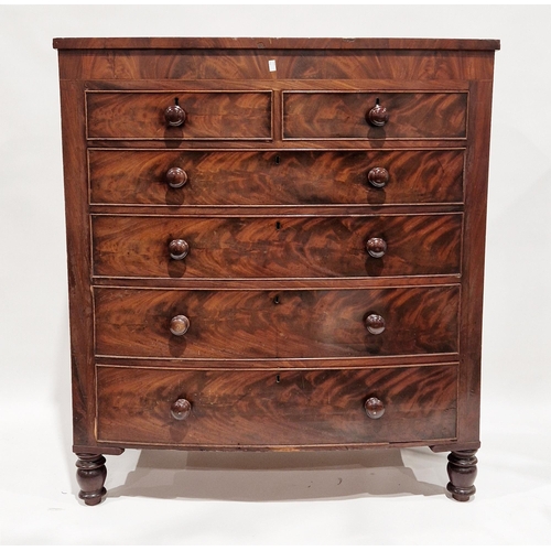 1079 - Early 19th century flamed mahogany and mahogany bowfronted chest of two short over four long drawers... 