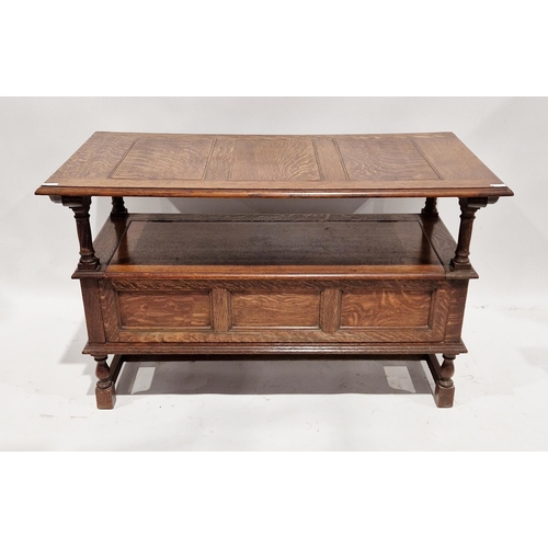 1093 - Early 20th century Waring & Gillows oak monk's bench, the three-panel top folding back to form a ben... 