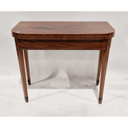 1108 - 19th century mahogany card table with boxwood and ebony string inlay, the rectangular foldover top w... 