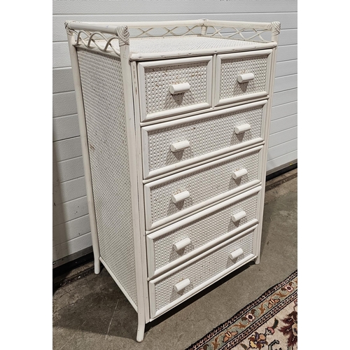 1191 - A white painted wicker and bamboo effect chest of drawers comprising two short over four long measur... 