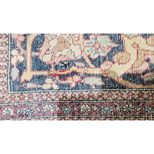 1212 - Eastern wool rug of Persian design, having black arabesque to the cherry red field with allover flor... 