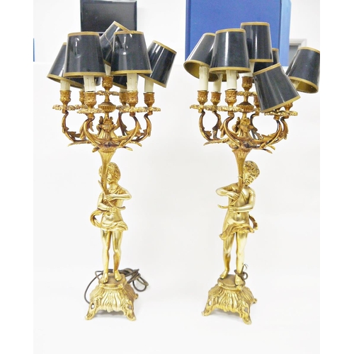 137 - Pair of gilt metal figural six branch table lamps in the rococo manner, 82cm high