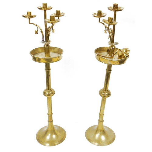 157 - Pair of brass Gothic Revival four branch altar candlesticks with drip pans and detachable tops, 77cm... 