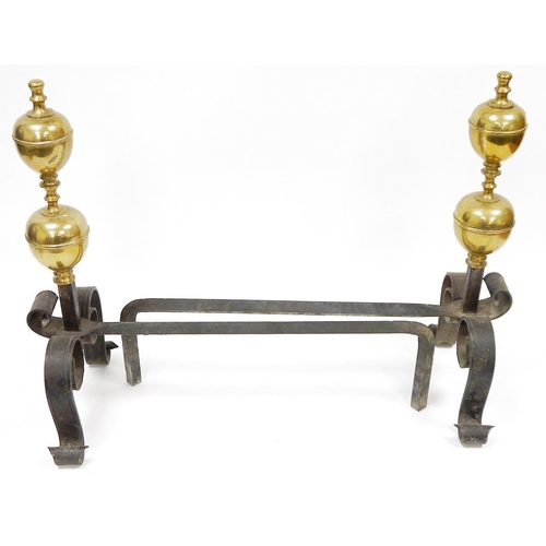 178 - Pair of Arts and Crafts wrought iron and brass-mounted firedogs, each with double brass knop finials... 