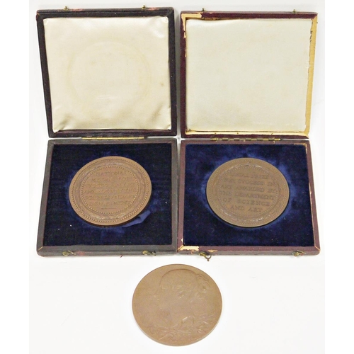 200 - Three Victorian bronze medallions, two cased dated 1856, one a local prize and the other a national ... 