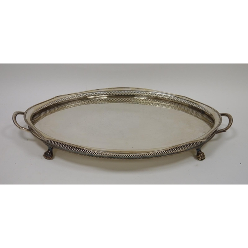 295 - Large early 20th century oval two-handled EPNS galleried tray with beaded rim, raised on four paw fe... 