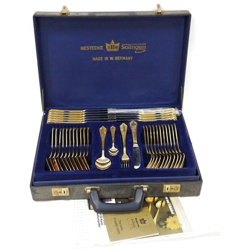 302 - SBS Bestecke Solingen gold plated canteen of cutlery in original carry briefcase and another canteen... 