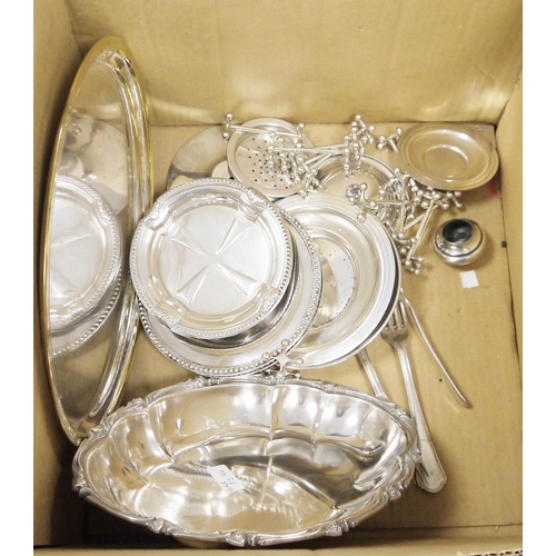 309 - Silver plated wares to include a vesta on ashtray, numerous knife rests, oval trays, wine bottle coa... 