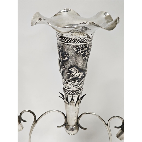 314 - Indian colonial white metal epergne, stamped with maker's mark, the three trumpets with repousse dec... 