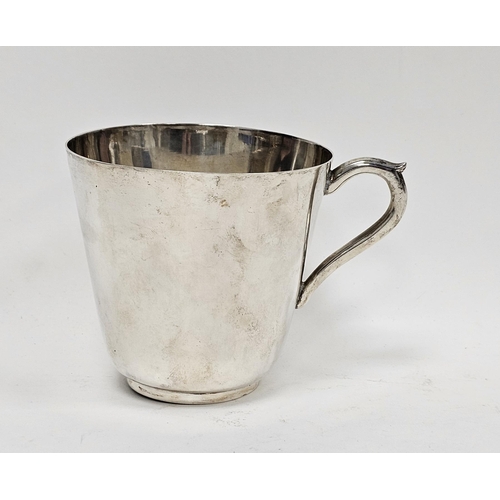 315 - Indian white metal cup with gilt lined interior, of plain tapering form and loop handle, engraved to... 