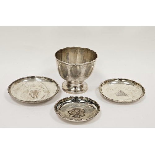 318 - Hong Kong white metal trophy, engraved and dated 1980 and three sporting commemorative small pin dis... 