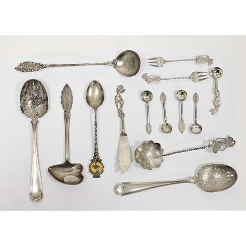 329 - Collection of white metal flatware including South East Asian spoon, butter knife, two small forks a... 