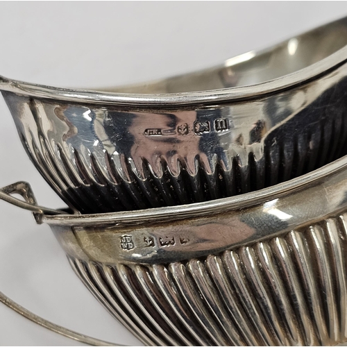 365 - George III pair of silver salts, London 1818 maker CH, with gadrooned rims and raised on three hoof ... 