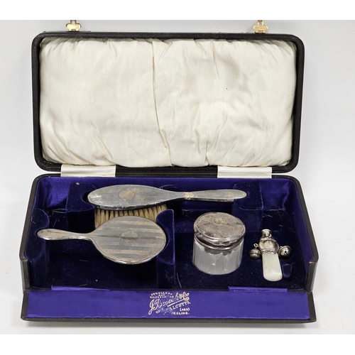 380 - George V silver child's christening dressing table set, Birmingham 1926 , comprising a silver backed... 