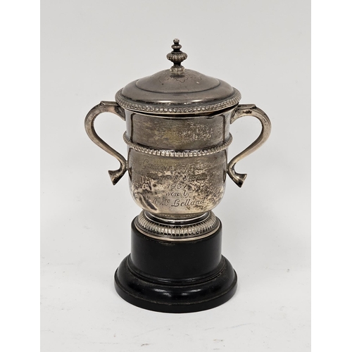 387 - Silver trophy with cover, London 1936, D&J Welby Limited, with twin scrolling handles and beaded edg... 