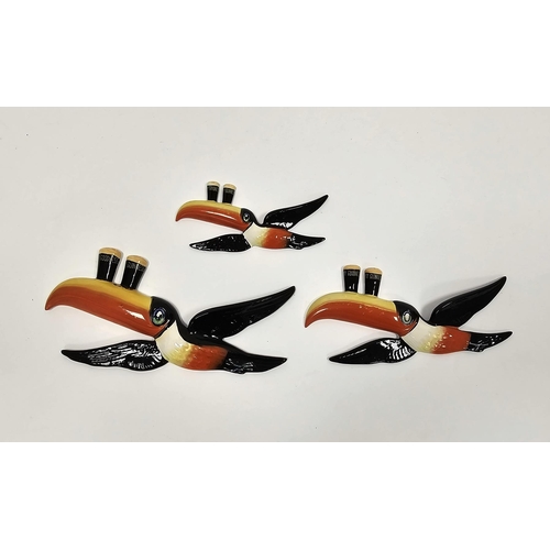 40 - Set of three Carltonware ceramic graduating Guiness toucan wall plaques the largest 25cm long