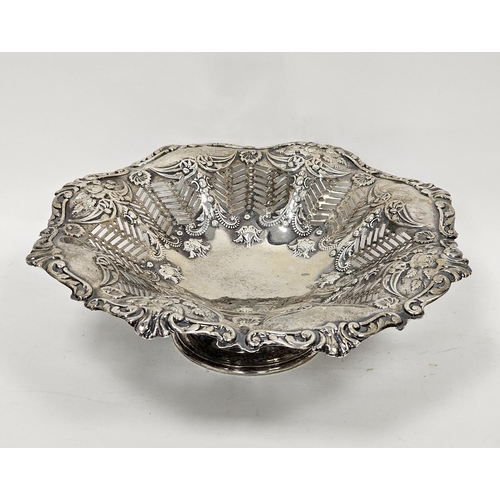 414 - Silver footed fruit bowl, rubbed hallmarks but probably Victorian, the bowl of wavy outline with rep... 