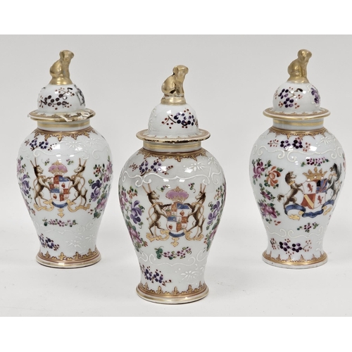 42 - Three 19th century Samson of Paris porcelain baluster vases and covers, decorated in the Chinese man... 