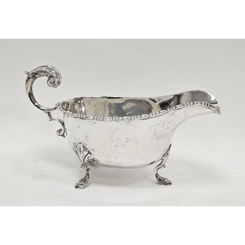 430 - George V Irish Silver Sauce Boat, Reid & Sons, Dublin 1912, the plain body with beaded rim, acanthus... 